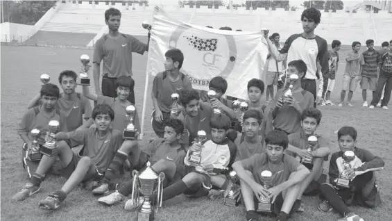  ??  ?? Conscient FA boys celebrate their triumph in the U- 14 category of the DSA inter- academies football tournament at Delhi’s Ambedkar Stadium.