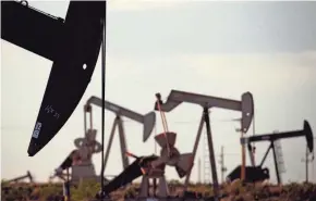  ?? CHARLIE RIEDEL/AP FILE ?? In the closing months of the Trump administra­tion, energy companies stockpiled enough drilling permits on public lands to pump oil for years.