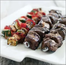  ?? CARL TREMBLAY/AMERICA’S TEST KITCHEN VIA ASSOCIATED PRESS ?? This photo provided by America’s Test Kitchen shows grilled beef kabobs in Brookline, Mass.