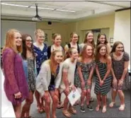  ?? DAN SOKIL — DIGITAL FIRST MEDIA ?? Members of the North Penn High School girls swimming and diving team pose for a group photo after receiving student proclamati­ons from the school board on April 20.