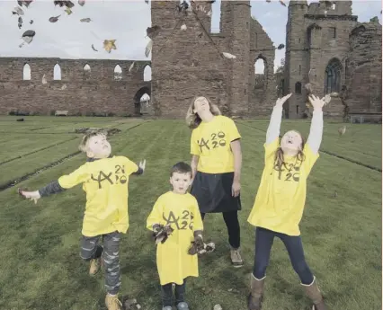  ??  ?? 0 Children celebrate the approach of the 700th anniversar­y of the Declaratio­n of Arbroath in September last year