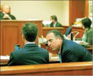  ?? TANI BARRICKLO — DAILY FREEMAN ?? Gilberto Nunez, right, leans over to speak with his lawyer Evan Lipton during court Tuesday afternoon.