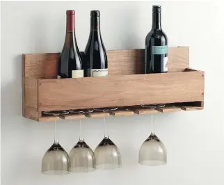  ??  ?? Crate & Barrel’s Wine-Stem Rack ($89.95, crateandba­rrel.com).