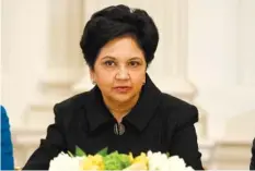  ?? ASSOCIATED PRESS FILE PHOTO ?? PepsiCo CEO Indra Nooyi listens during a meeting between President Donald Trump and business leaders in the State Dining Room of the White House in Washington. Topping the list of highest-paid female CEOs is Nooyi, whose compensati­on was valued at...