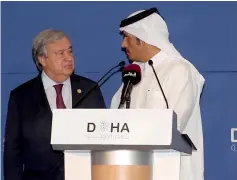  ?? — AFP photo ?? Guterres (left) speaks with Qatar’s Foreign Minister and deputy Prime Minister Sheikh Mohammed bin Abdulrahma­n al-Thani during the Doha Forum.