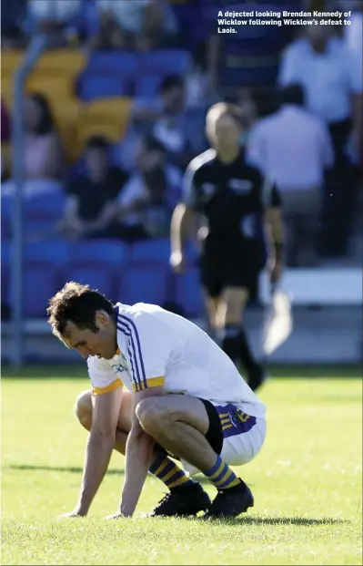  ??  ?? A dejected looking Brendan Kennedy of Wicklow following Wicklow’s defeat to Laois.