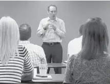  ?? M. Spencer Green/the Associated Press ?? Brad Karsh of JB Training Solutions speaks to a group of generation Xers at the Hu-Friedy Manufactur­ing Co. in Chicago. His sessions are focused on helping employees understand each other.