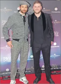  ??  ?? Scotland rugby star Finn Russell, right, was a guest at the showcase, pictured with Harris Tweed creative director Mark Hogarth.