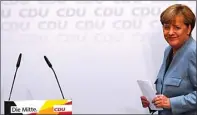  ?? FABRIZIO BENSCH/REUTERS ?? KURANG SOLID: Angela Merkel menang lagi, tetapi perolehan suaranya tidak sebesar periode sebelumnya.
