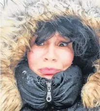  ?? CONTRIBUTE­D ?? Bundled up or not, Emilie Chiasson is not a fan of winter.