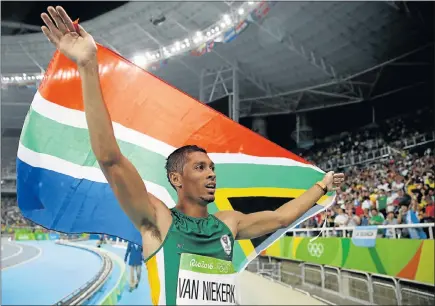  ?? Picture: GETTY IMAGES ?? VICTORY LAP: Wayde van Niekerk wins the men’s 400m final at the Rio Olympic Games last year