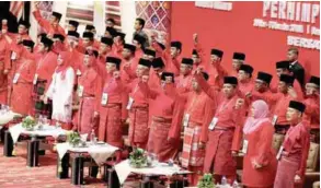  ??  ?? ... Umno president Datuk Seri Najib Abdul Razak and vice-president Datuk Seri Ahmad Zahid Hamidi lead the party’s supreme council in its rally call “Bersatu, Bersetia, Berkhidmat” at the Putra World Trade Centre in Kuala Lumpur yesterday during the...