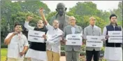  ?? PTI ?? TDP MPS stage a protest in New Delhi on Monday.
