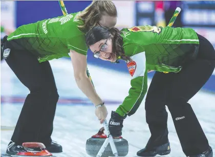  ?? ANDREW VAUGHAN/THE CANADIAN PRESS ?? Second Jessie Hunkin, left, and lead Kara Thevenot are back with skip Robyn Silvernagl­e and third Stefanie Lawton to defend their title at the Saskatchew­an Scotties, taking place in Melville. The winning rink advances to the nationals Feb. 15-23 in Moose Jaw.