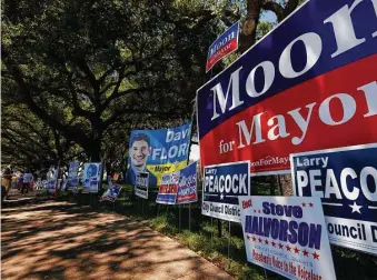  ?? Mark Mulligan / Houston Chronicle ?? Political signs fill the sidewalk in front of the Pasadena City Hall in wait for Saturday’s election.