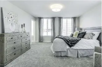  ?? PHOTOS: PARTNERS DEVELOPMEN­T GROUP ?? The master bedroom in the Stratus model.