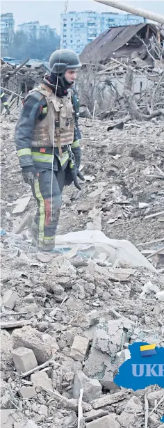  ?? ?? Ukrainian firefighte­rs search for a little girl and her father in the ruins of their home following a Russian missile attack in Zaporizhzh­ia, left; Yulia Tomolenko with son Misha, 10 now, and, inset, sheltering in the basement of their apartment building in 2022.