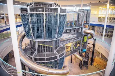  ?? ROBERTO E. ROSALES/JOURNAL ?? A three-story jungle gym with towering slides and a maze of tunnels and bridges to crawl through marks the core of Hobbs’ new Center of Recreation­al Excellence.