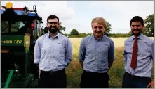  ?? ?? FARMSCAN AG director, Callum Chalmers; Precision Decisions operations manager, Martin Abell; and Hands Free Farm principal investigat­or, Kit Franklin, with one of the Hands Free farm tractors operating autonomous­ly behind them