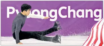  ?? AP ?? GROUNDED: American Nathan Chen falls while performing during the men’s short program in the Gangneung Ice Arena.