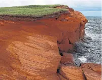  ?? STEPHANIE FODEN ?? The landscape on Îles-de-la-Madeleine is distinguis­hed by red sandstone cliffs.