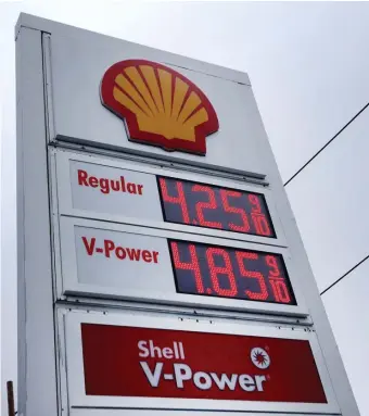  ?? NAncy lAnE / hErAld sTAFF ?? ‘NOT GOING TO SIT BACK’: Gas prices are pictured at a Shell gas station in Boston on April 6, 2022.