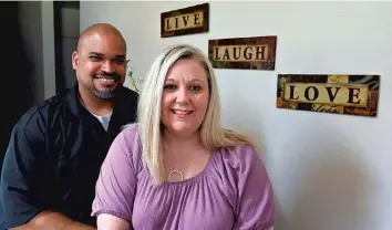  ?? TIMOTHY D. EASLEY/AP ?? Dante Murry, left, who has schizoaffe­ctive disorder, and his wife, Chastity Murry, who is diagnosed with bipolar disorder, depend upon each another daily to help cope with their mental illness. Chastity called them perfect partners.