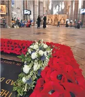  ??  ?? Clockwise from right: Princess Eugenie and Jack Brooksbank at their evening reception; sharing a kiss during their carriage ride; the Princess’s bouquet on the Grave of the Unknown Warrior