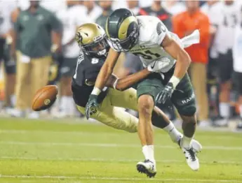  ?? Cliff Grassmick, Daily Camera ?? Redshirt freshman cornerback Trey Udoffia has broken up five passes in his first season as a starter in CU’s secondary. “He’s played pretty well,” his position coach says.