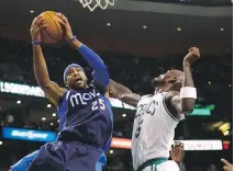  ??  JARED WICKERHAM/GETTY IMAGES ?? In his heyday with the Raptors, Vince Carter, left, helped raise awareness and excitement over basketball.