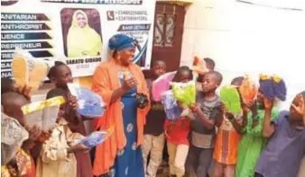  ??  ?? Actress Saratu Gidadao during one of her humanitari­an activities in Kano