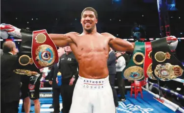  ?? File / Agence France-presse ?? ↑ Anthony Joshua compares Oleksandr Usyk’s lack of experience to boxing legend Evander Holyfield’s before tackling a heavyweigh­t championsh­ip fight.