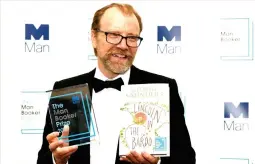  ??  ?? George Saunders poses after winning the Man Booker Prize for Fiction 2017 in London. (Reuters)