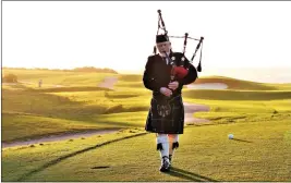  ?? ?? A bagpiper performs daily on the course at The Links at Spanish Bay in Pebble Beach.