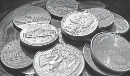  ?? JENNY KANE/AP ?? A group of trade associatio­ns is asking the Treasury Department for more help convincing Americans to get coins back in circulatio­n.