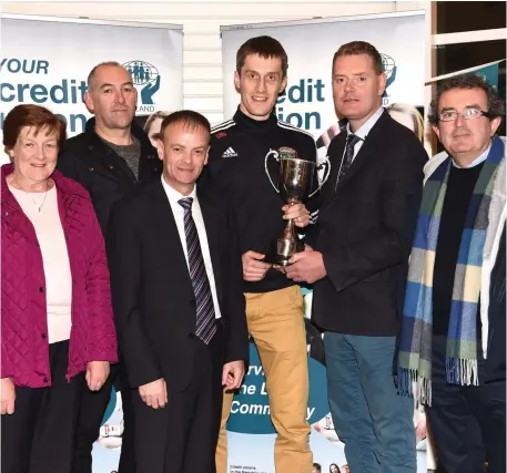  ?? Photo by Michelle Cooper Galvin ?? John Long Chairman Chapter 23 (third from left) and Tim Murphy Chairman Kerry County Board who made a special presentati­on to Aiden Roche Chairman, Colin Mcgillicud­dy Captain and Brian Sugrue of Glenbeigh Glencar to mark their Club’s All Irelandf...