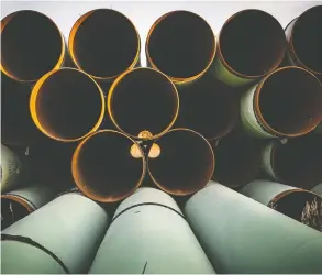  ?? ANDREW BURTON / GETTY IMAGES FILES ?? With three new pipelines all advancing, Canada will eventually be able to bring
an additional 1.85 million barrels per day to market, according to CAPP.