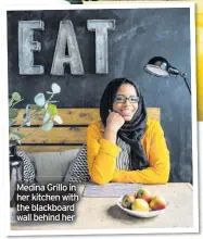  ??  ?? Medina Grillo in her kitchen with the blackboard wall behind her