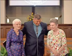  ?? sean Williams ?? Antioch Baptist Church pastor Jonathan Blackmon celebrated the congregati­on’s 175th year with two of the oldest current members during an April 13 event.