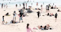  ?? REUTERS ?? SUNSEASON Beachgoers are seen at Bondi Beach despite of an outbreak of the coronaviru­s disease in SydneyonDe­c. 22. —