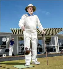  ??  ?? Ron Radford, 100, is still capable of having a roll up at the Cashmere Bowling Club in Christchur­ch.