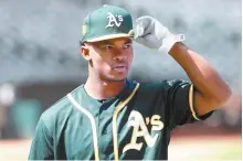  ?? AP-Yonhap ?? Oakland Athletics draft pick Kyler Murray looks on before a baseball game between the Athletics and the Los Angeles Angels in Oakland, Calif. in this June 15, 2018 file photo.