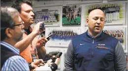  ?? Jessica Hill / Associated Press ?? UConn athletic director David Benedict holds a news conference in his office on Saturday.