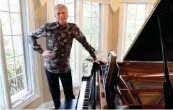  ?? Tribune News Service ?? Songwriter Dennis Deyoung with his piano at his west suburban home with a recording studio in the basement.