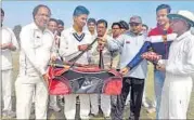  ??  ?? Young trainee of the National Cricket Club Anurag Pal being honoured in Lucknow on Sunday.