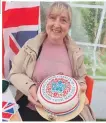  ?? ?? Margaret Coots won this coronation cake at Clachan’s cream tea celebratio­ns.