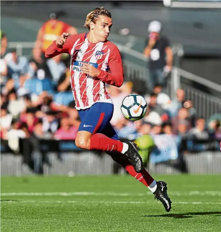  ??  ?? Running dry: Antoine Griezmann, Atletico Madrid’s top scorer for the past three seasons, has only scored three goals in 11 matches. — Reuters