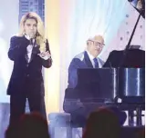  ??  ?? Ryan Cayabyab and KZ Tandingan perform at the awards night.