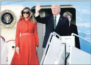  ?? AP ?? Donald Trump with First Lady Melania and son Barron at Palm Beach Internatio­nal Airport, Friday.