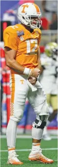  ?? STAFF PHOTO BY C.B. SCHMELTER ?? Tennessee quarterbac­k Quinten Dormady celebrates after a John Kelly touchdown against Georgia Tech on Monday night in Atlanta.
